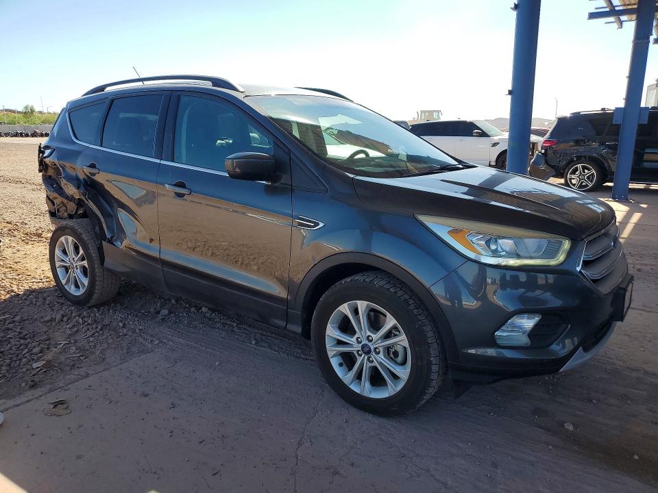 Photo 4 from auction – 2018 FORD ESCAPE with VIN 1FMCU9HD6JUB52920