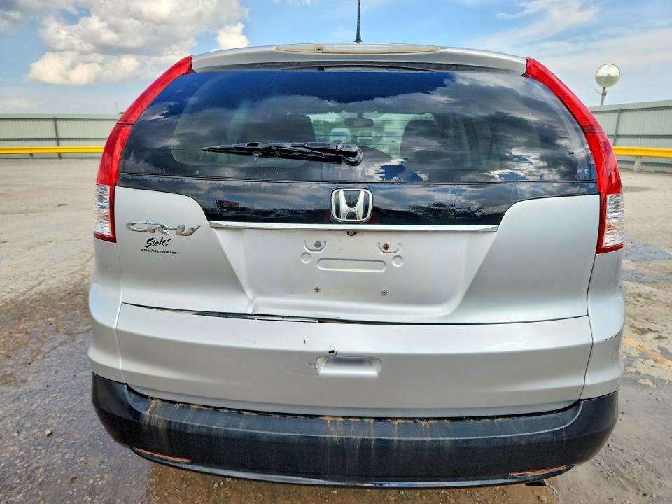 Photo 6 from auction – 2013 HONDA CR-V with VIN 2HKRM3H54DH511121