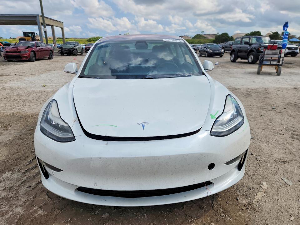 Photo 5 from auction – 2018 TESLA MODEL 3 with VIN 5YJ3E1EA4JF019658