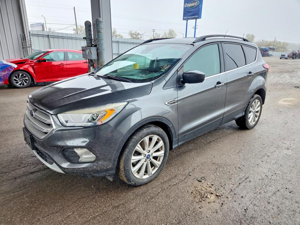 FORD ESCAPE 2019 with VIN 1FMCU9HD4KUA13161 - Photo from auction
