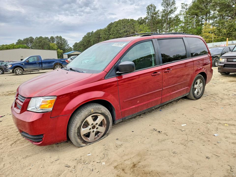 DODGE GRAND CARA 2010 with VIN 2D4RN3D18AR440300 - Photo from auction