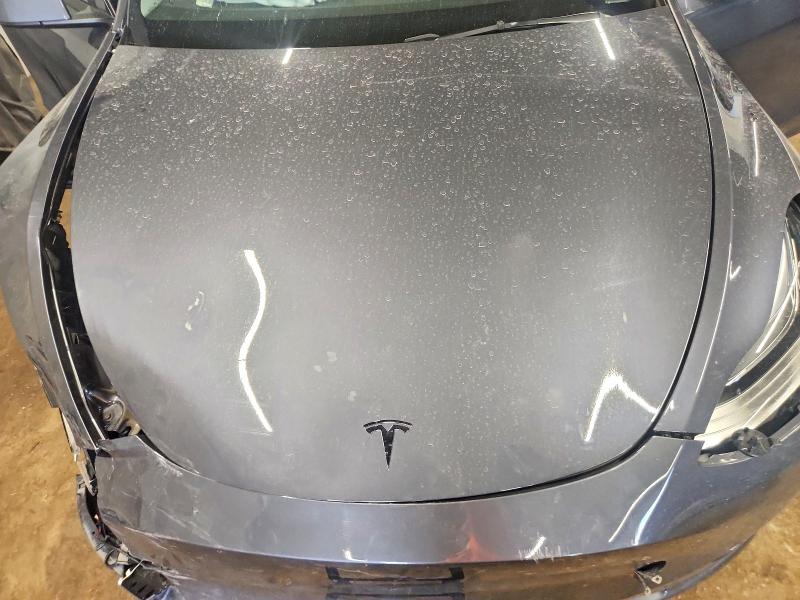 Photo 11 from auction – 2023 TESLA MODEL Y with VIN 7SAYGDEE2PF610247
