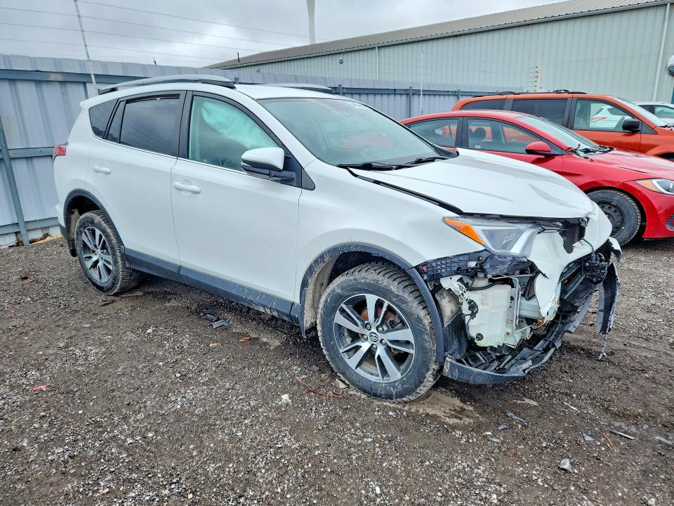 Photo 4 from auction – 2018 TOYOTA RAV4 with VIN 2T3ZFREV4JW481365