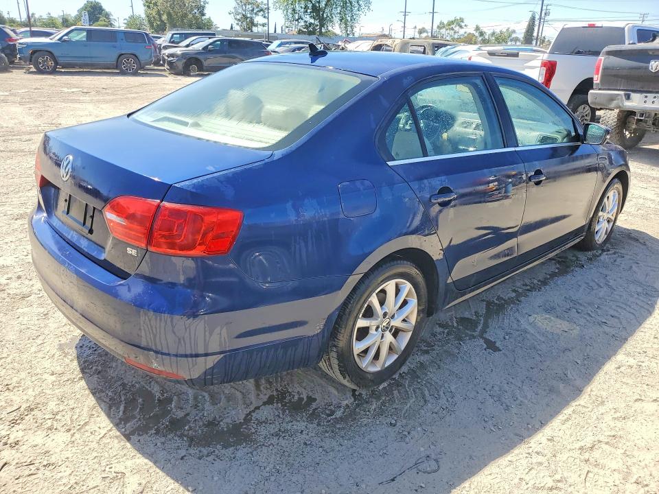 Photo 3 from auction – 2014 VOLKSWAGEN JETTA with VIN 3VWD17AJ1EM376593