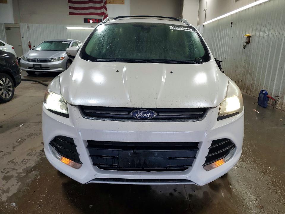 Photo 5 from auction – 2014 FORD ESCAPE with VIN 1FMCU9J98EUE11273