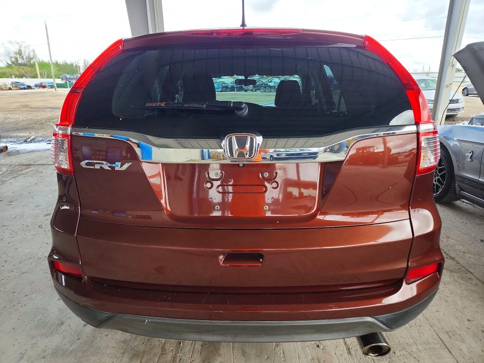 Photo 6 from auction – 2015 HONDA CR-V with VIN 2HKRM3H36FH510490