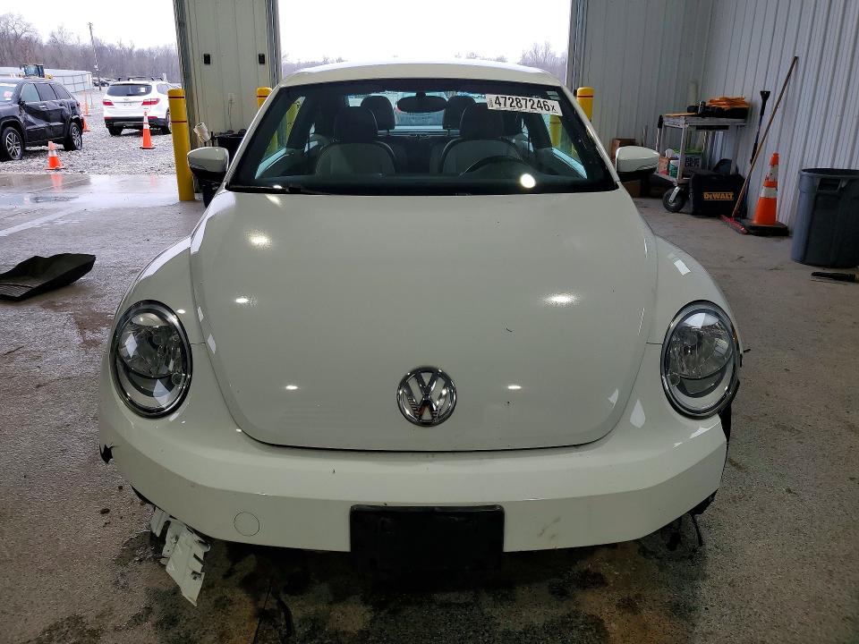 Photo 5 from auction – 2015 VOLKSWAGEN BEETLE with VIN 3VWF17AT8FM653350