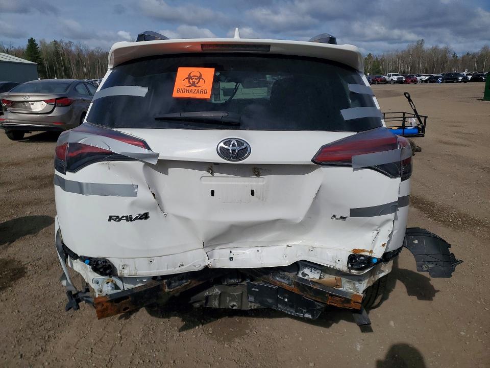 Photo 6 from auction – 2018 TOYOTA RAV4 with VIN 2T3ZFREV2JW469621