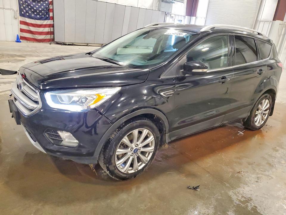FORD ESCAPE 2017 with VIN 1FMCU9JD6HUB06282 - Photo from auction