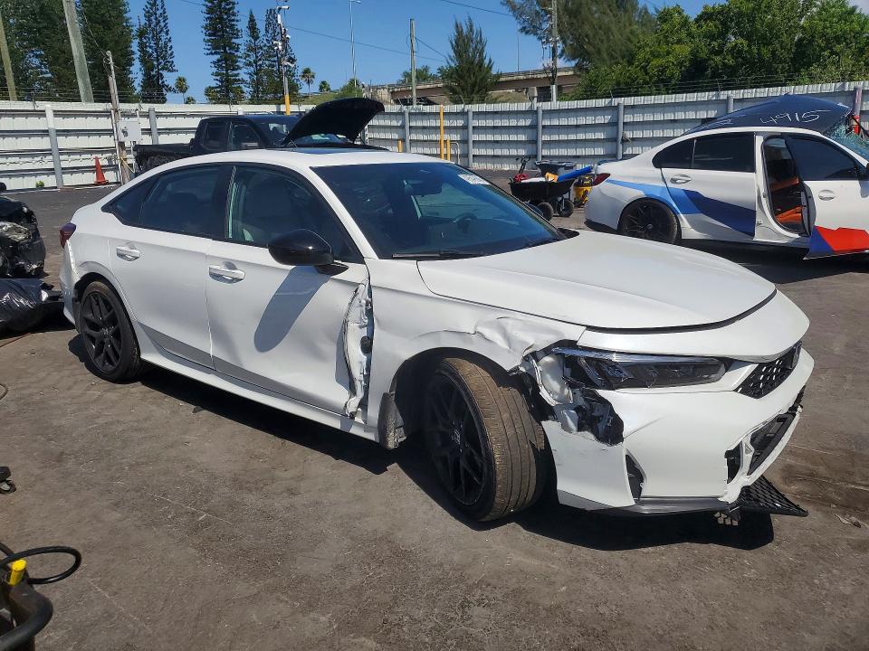 Photo 4 from auction – 2025 HONDA CIVIC with VIN 2HGFE4F82SH354411