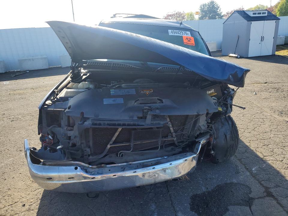 Photo 5 from auction – 2002 GMC YUKON with VIN 1GKEK13Z22R140036