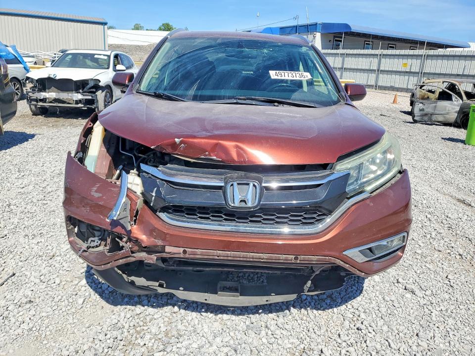 Photo 5 from auction – 2015 HONDA CR-V with VIN 2HKRM3H76FH502697
