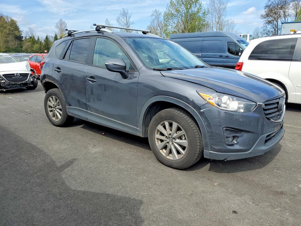 Photo 4 from auction – 2016 MAZDA CX-5 with VIN JM3KE2CY0G0876821
