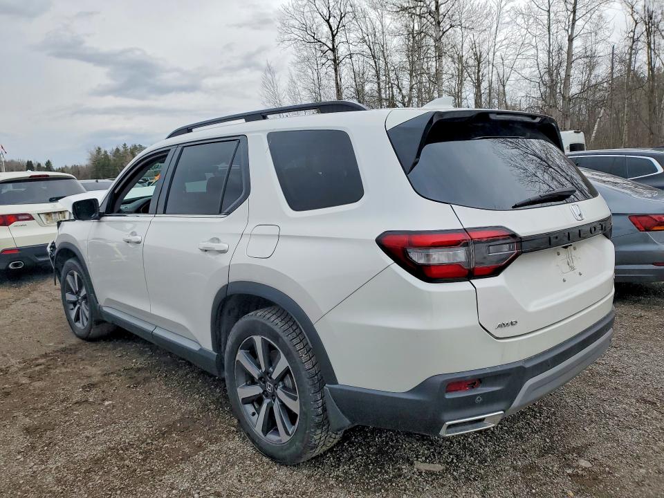 Photo 2 from auction – 2023 HONDA PILOT with VIN 5FNYG1H71PB503358