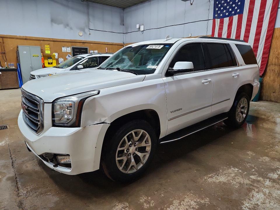 GMC YUKON 2016 with VIN 1GKS2BKC2GR483975 - Photo from auction