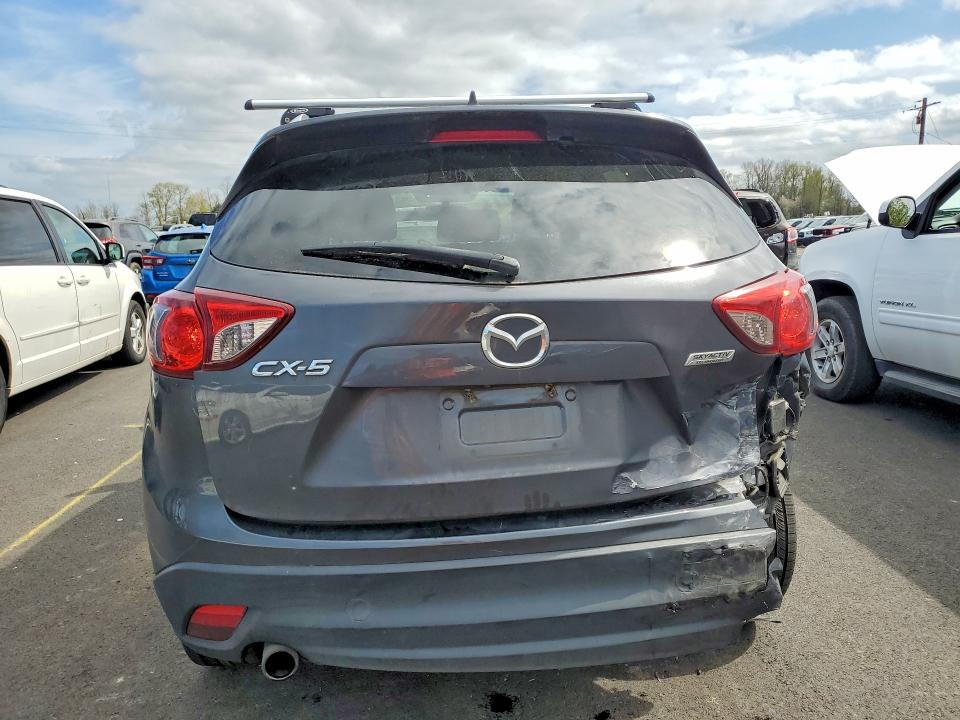Photo 6 from auction – 2016 MAZDA CX-5 with VIN JM3KE2CY0G0876821