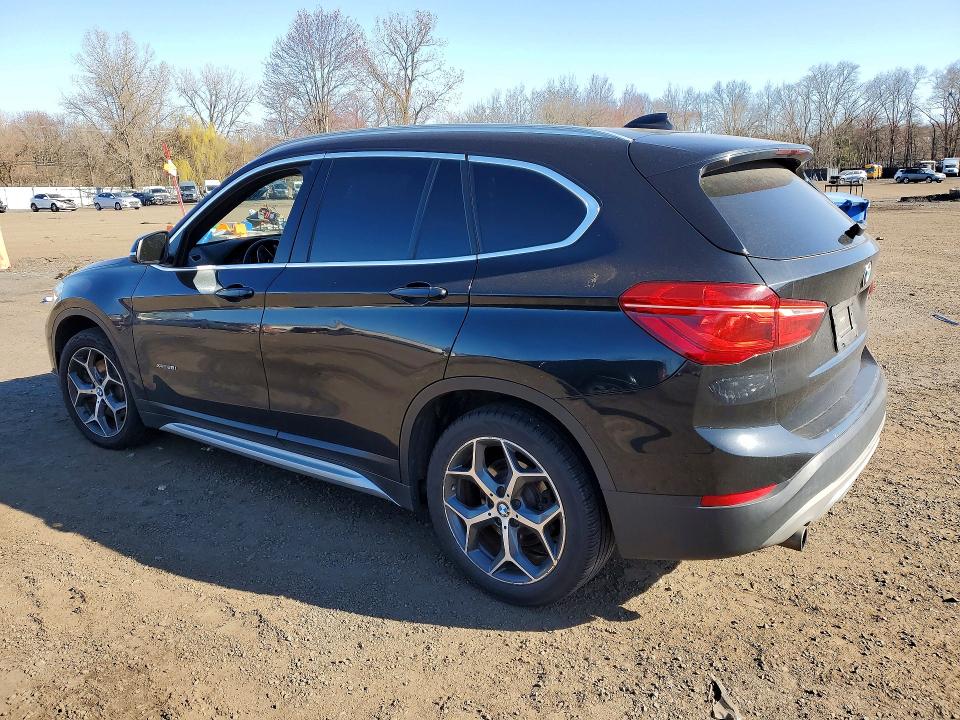 Photo 2 from auction – 2018 BMW X1 with VIN WBXHT3C30J5F89997