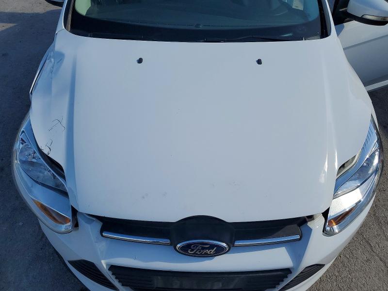 Photo 11 from auction – 2013 FORD FOCUS with VIN 1FADP3F24DL296724