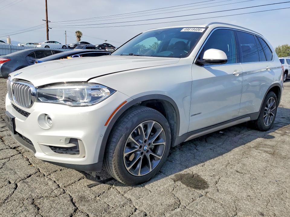 BMW X5 2018 with VIN 5UXKR2C51J0X08792 - Photo from auction
