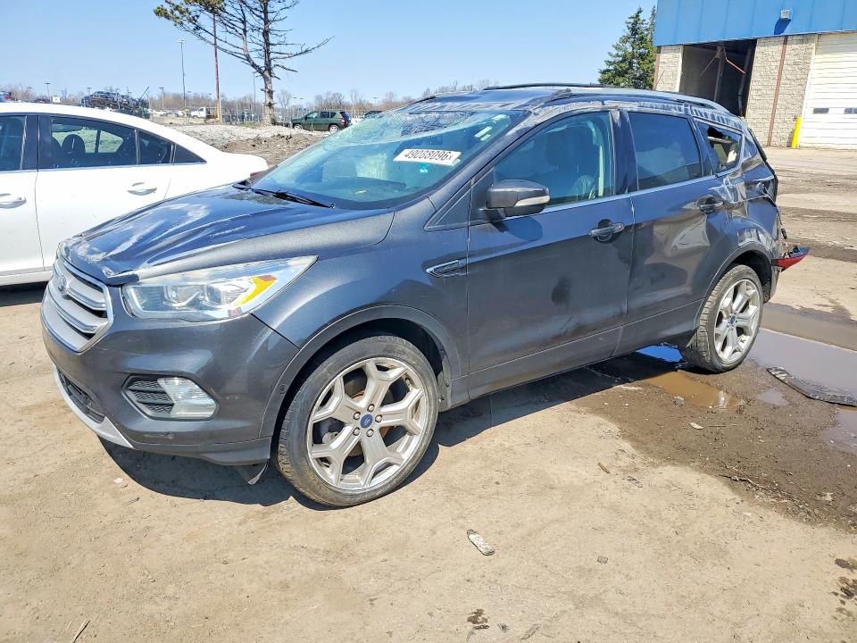 FORD ESCAPE 2019 with VIN 1FMCU9J93KUA33066 - Photo from auction