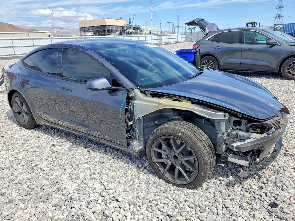 Photo 4 from auction – 2023 TESLA MODEL 3 with VIN 5YJ3E1EAXPF713411