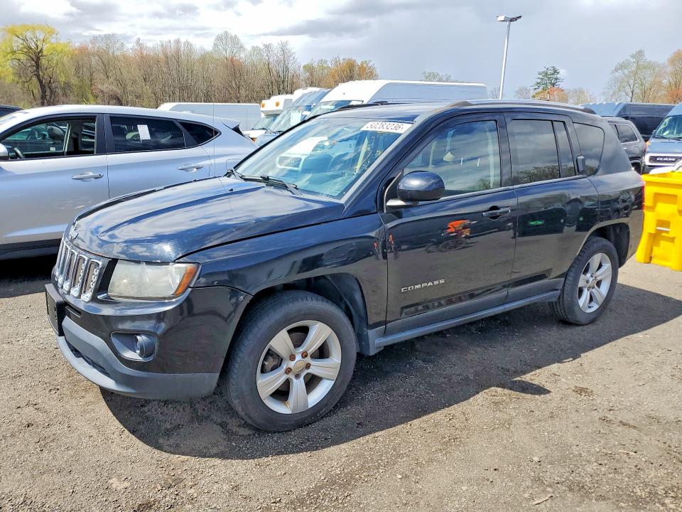 JEEP COMPASS 2014 with VIN 1C4NJDEB7ED730802 - Photo from auction
