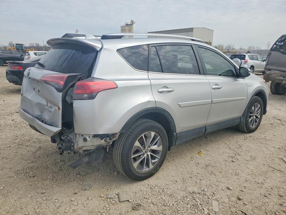 Photo 3 from auction – 2016 TOYOTA RAV4 HV with VIN JTMRJREV7GD013151