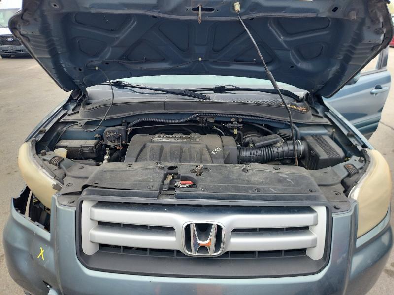 Photo 12 from auction – 2007 HONDA PILOT with VIN 2HKYF18597H536272