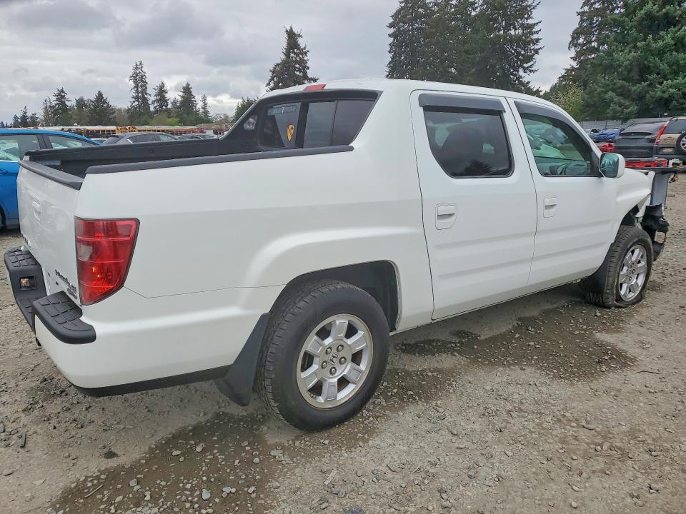 Photo 3 from auction – 2009 HONDA RIDGELINE with VIN 5FPYK16429B101690
