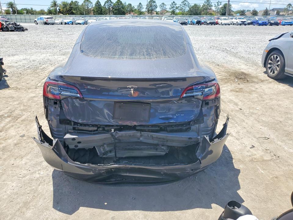 Photo 6 from auction – 2022 TESLA MODEL 3 with VIN 5YJ3E1EB7NF323016