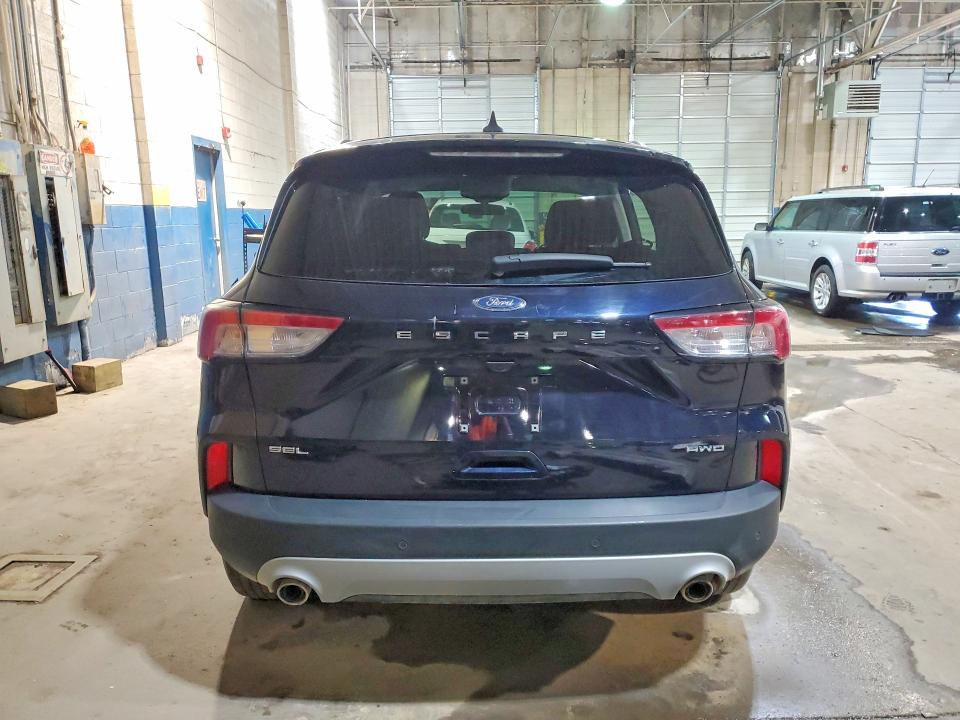 Photo 6 from auction – 2021 FORD ESCAPE with VIN 1FMCU9H60MUA86404