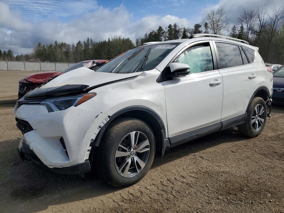TOYOTA RAV4 2018 with VIN 2T3ZFREV2JW469621 - Photo from auction