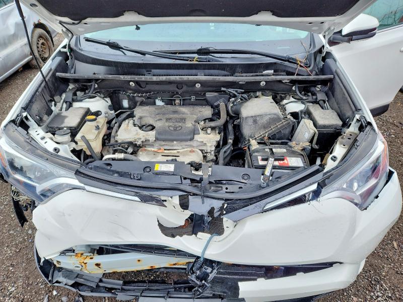 Photo 12 from auction – 2018 TOYOTA RAV4 with VIN 2T3ZFREV4JW481365