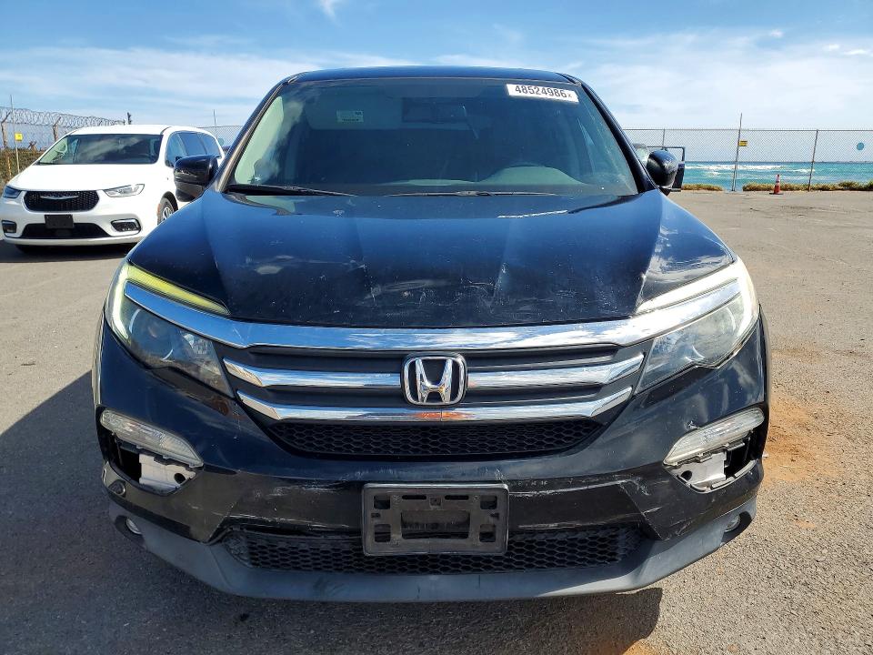 Photo 5 from auction – 2016 HONDA PILOT with VIN 5FNYF6H57GB093082