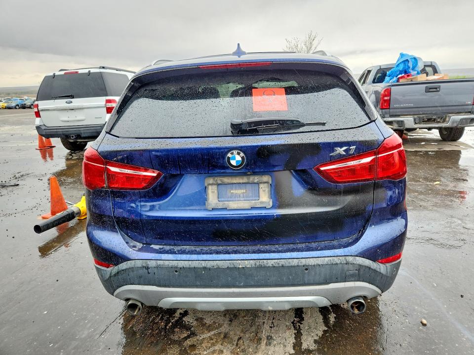 Photo 6 from auction – 2017 BMW X1 with VIN WBXHT3C36H5F85110