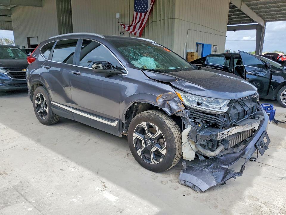 Photo 4 from auction – 2018 HONDA CR-V with VIN 2HKRW2H94JH674418