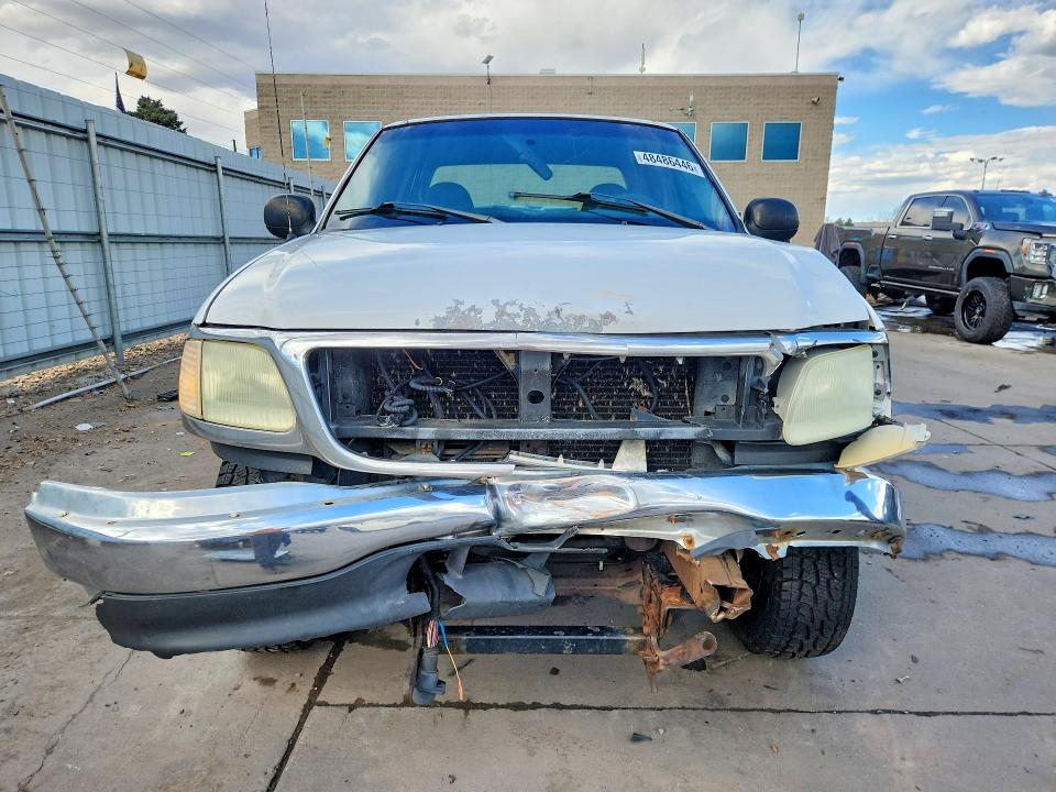 Photo 5 from auction – 2001 FORD F150 with VIN 1FTRX18L61NB80208
