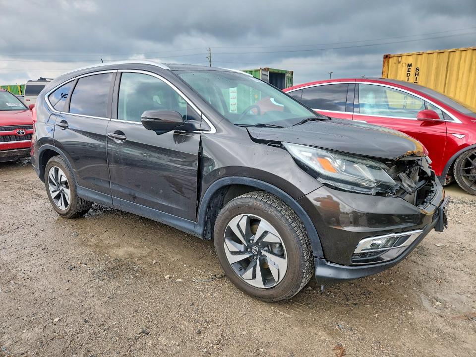 Photo 4 from auction – 2015 HONDA CR-V with VIN 5J6RM4H98FL097181