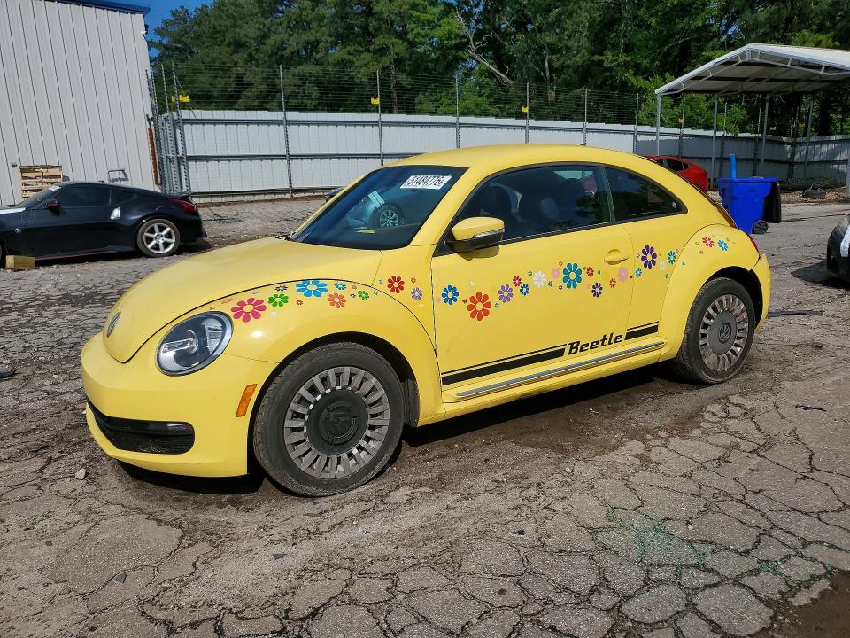 VOLKSWAGEN BEETLE 2014 with VIN 3VWJP7AT3EM631733 - Photo from auction