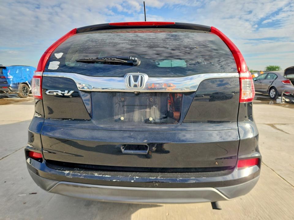 Photo 6 from auction – 2016 HONDA CR-V with VIN 3CZRM3H38GG702353