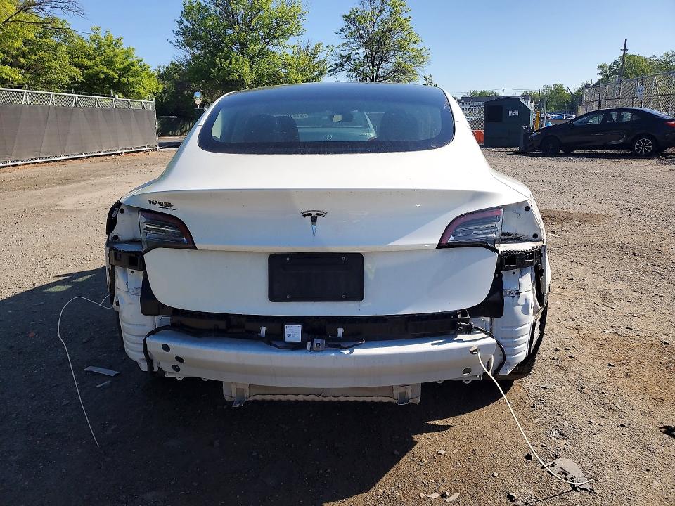 Photo 6 from auction – 2023 TESLA MODEL 3 with VIN 5YJ3E1EA5PF477539