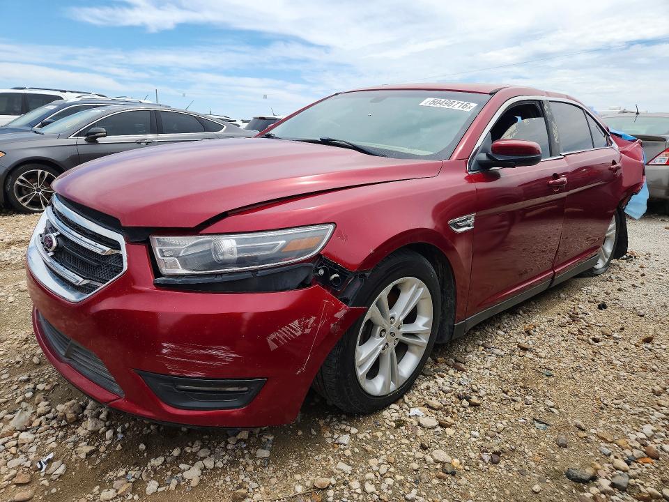 FORD TAURUS SE 2015 with VIN 1FAHP2E80FG206885 - Photo from auction