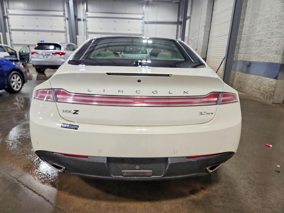 Photo 6 from auction – 2016 LINCOLN MKZ with VIN 3LN6L2NK1GR624547