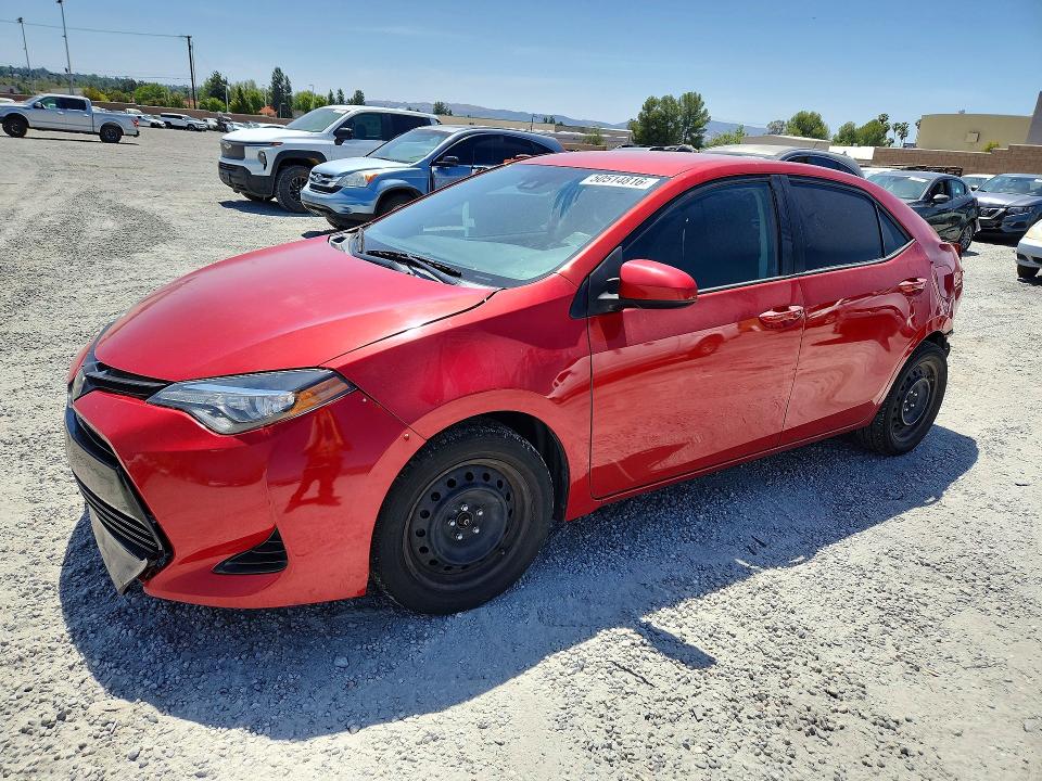 TOYOTA COROLLA 2018 with VIN 5YFBURHE8JP818729 - Photo from auction