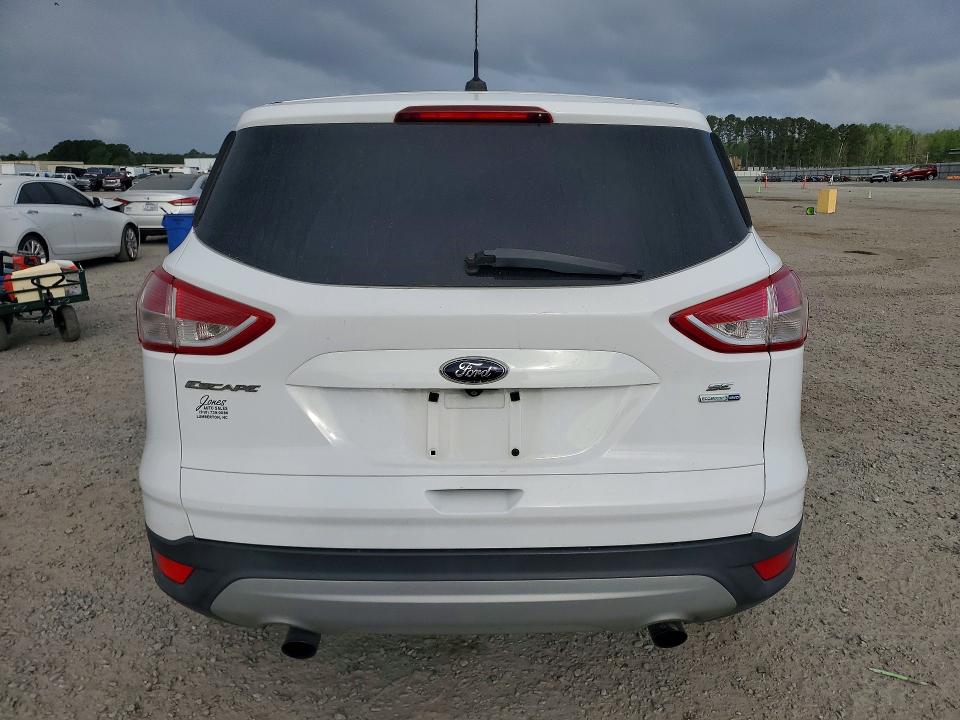 Photo 6 from auction – 2014 FORD ESCAPE with VIN 1FMCU9G96EUD06156