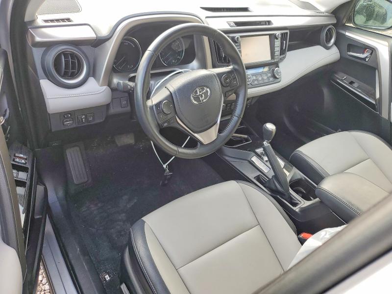 Photo 8 from auction – 2018 TOYOTA RAV4 HV with VIN JTMDJREV0JD163832