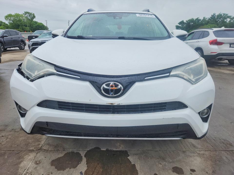 Photo 5 from auction – 2017 TOYOTA RAV4 with VIN JTMRFREV1HD198381