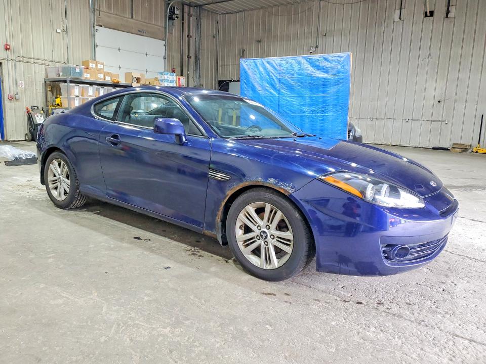 Photo 4 from auction – 2007 HYUNDAI TIBURON with VIN KMHHM66D07U255265