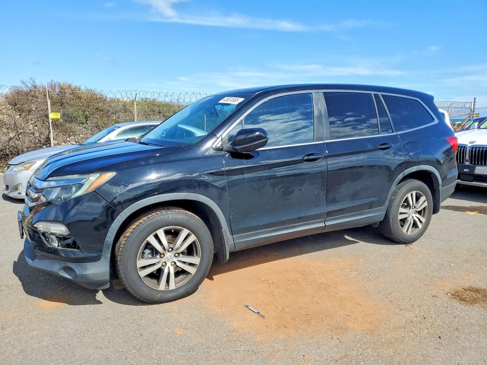 HONDA PILOT 2016 with VIN 5FNYF6H57GB093082 - Photo from auction