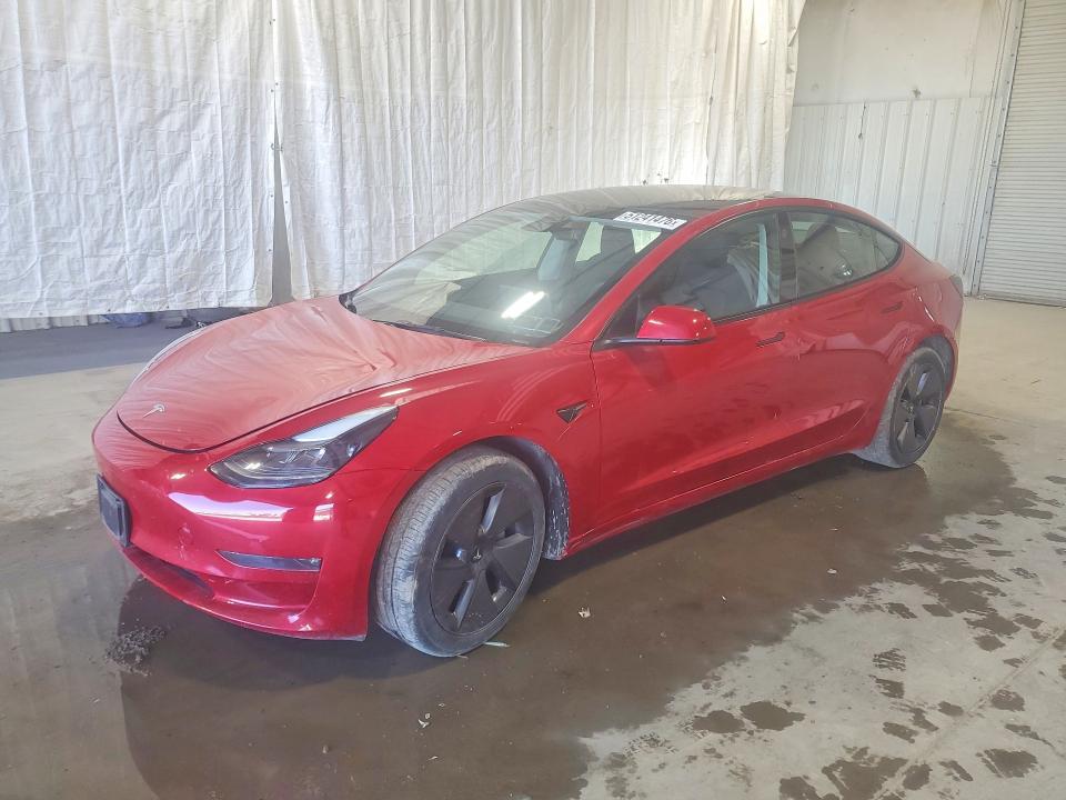 TESLA MODEL 3 2023 with VIN 5YJ3E1EBXPF617156 - Photo from auction